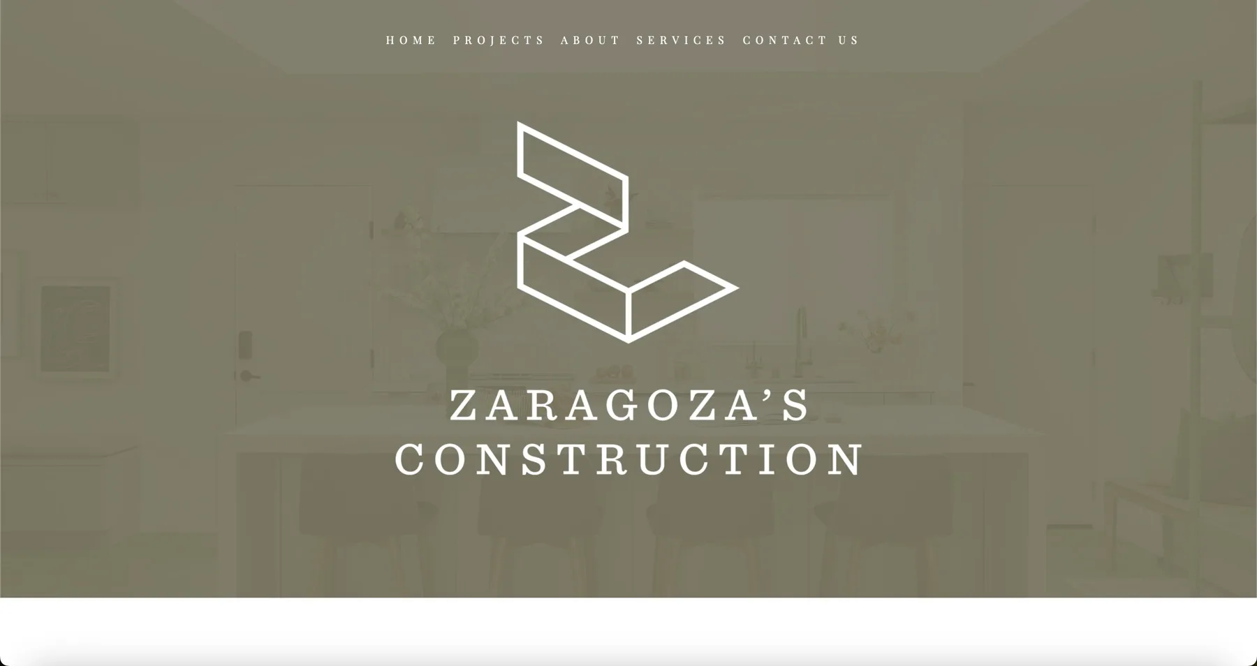 Zaragoza's Construction home page with a geometric Z logo over a muted kitchen photo